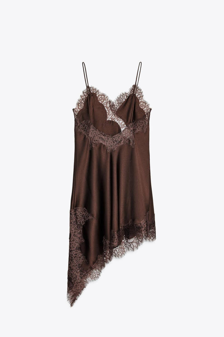 Brown lace-trimmed slip dress on a white background