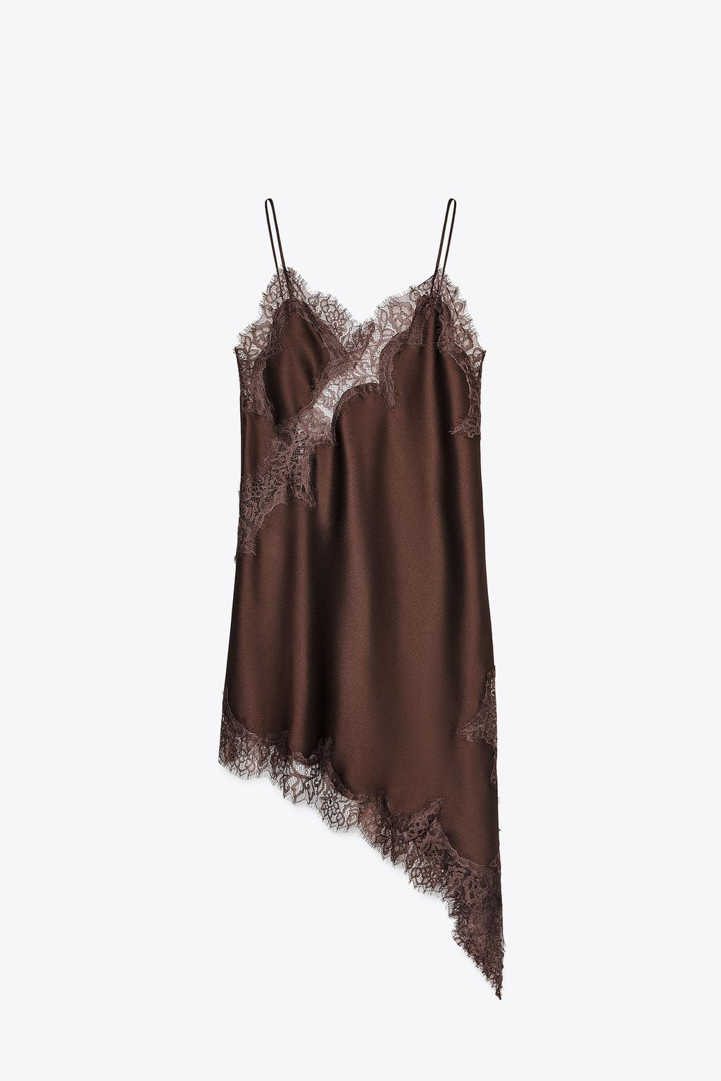 Brown satin slip dress with lace details on a white background