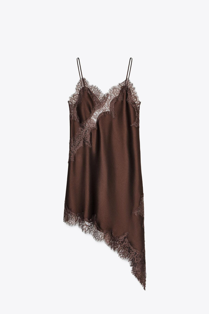 Brown satin slip dress with lace details on a white background
