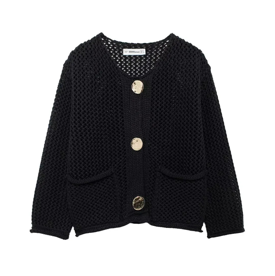 Black knitted cardigan with gold buttons on a white background