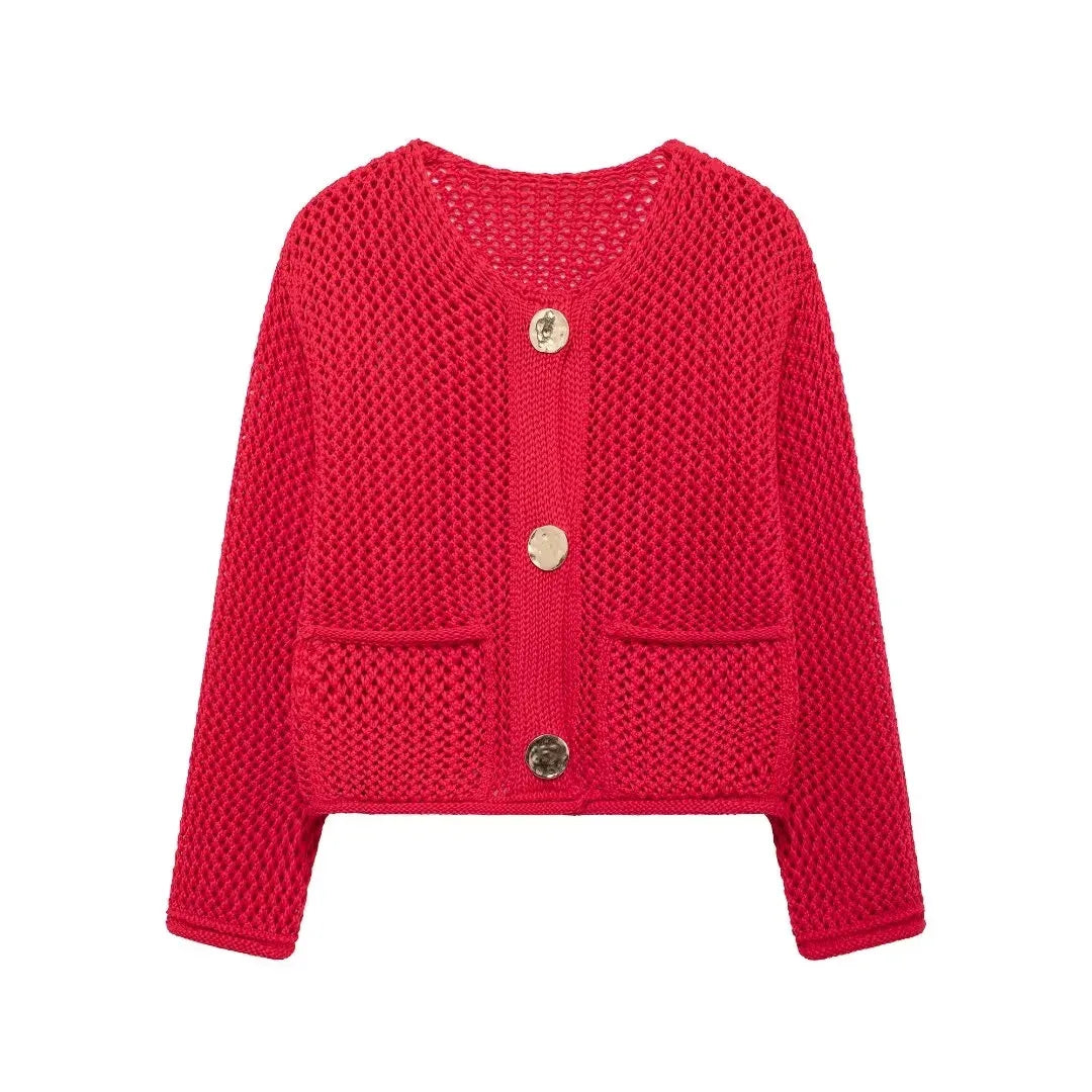 Red knitted cardigan with gold buttons on a white background