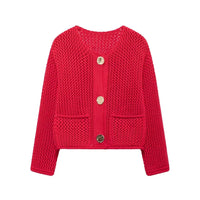 Red knitted cardigan with gold buttons on a white background