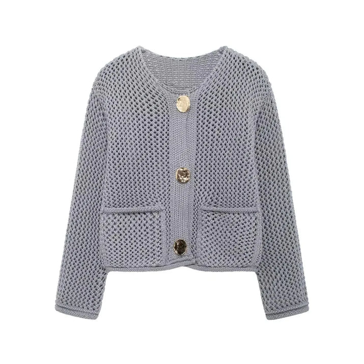 Light blue knitted cardigan with button details on a white background